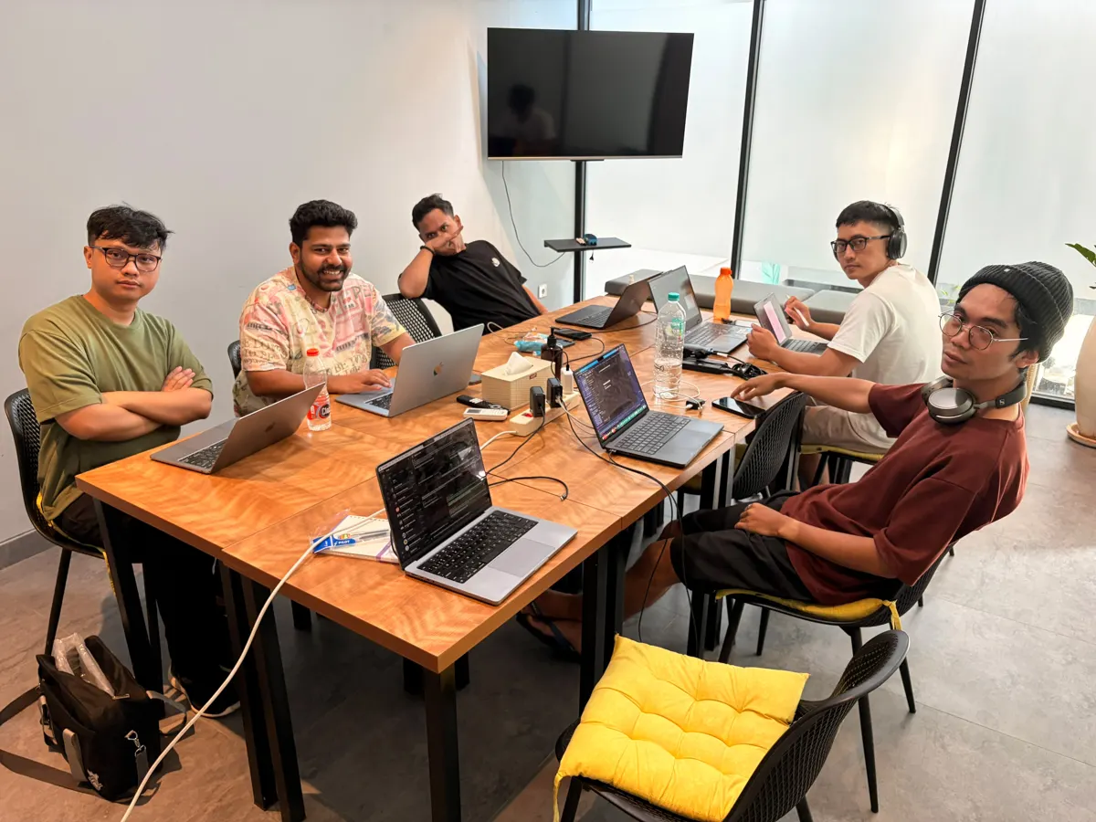 The team working together at one table
